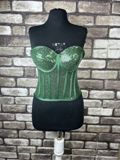 Corset emerald green, sequin corset, sequined corset, sequined bustier, black sequin corset top, party, black, cosplay and clubwear. Adjustable corset with back tie, Good for party, costume, cosplay and clubwear.  We design our products ourselves and produce them in our workshop. We are happy to present it to you. We have stated the size chart in the photos. You can contact us for your size-related questions. Please contact us for your questions and suggestions. Sequin Corset With Sweetheart Neckline, Sequin Corset With Sweetheart Neckline And Fitted Bodice, Green Strapless Corset Dress For Parties, Strapless Party Bodice With Corset Back, Green Corset Dress With Sweetheart Neckline For Party, Strapless Sequined Corset For Prom, Green Corset With Boned Bodice, Sequined Corset With Fitted Bodice For Parties, Green Corset With Boned And Fitted Bodice