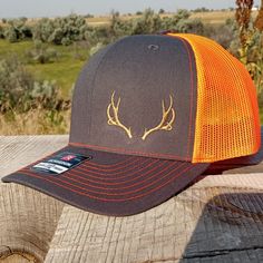 Pick your favorite hat color and enjoy this deer antler trucker hat. Embroidered on the American favorite, Richardson 112, these caps make great gifts for hunters, hikers, dad, grandpa, or boyfriend. Getting married to a hunter? Create unique wedding party caps with your monogram here. Contact us if you would like custom small business merch and gift shop inventory made from this design. Outfitters love this design. Make it Yours from Your Hats MT This deer antler hat can be customized and embroidered with monograms, anniversaries, and special event dates as well. We've even created logo gear with these rustic antlers. If you would like us to embroider in the center of the antlers you can do so here. Richardson 112 Cap Key Features: 60/40 cotton/polyester 100% polyester mesh back Structure Business Merch, Antler Hat, Monogram Hats, Icon X, Area Codes, Gifts For Hunters, Deer Antler, Kids Corner, Deer Antlers