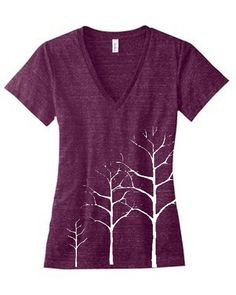 a women's v - neck shirt with trees on it