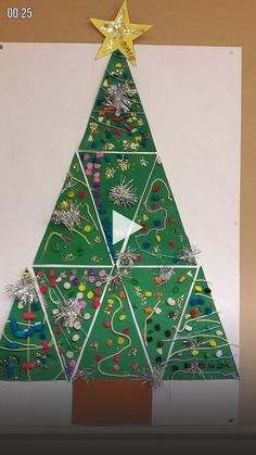 a christmas tree made out of construction paper