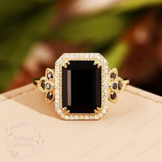 "❤Jewelry Details -Gold Type : Solid 14k gold Center Stone: Natural Black Onyx 8*11mm, Approximately 2.8ct Cut: Emerald Cut / 3EX Stone Type: Natural White Diamond, Natural Black Diamond 0.28ctw Cut: Round Cut / 3EX Band Width: Approximately 1.6mm SKU: YR0403 ~*-*~Purchase Guarantee: - All our jewelry is handmade, and each process is refined. - 14 Day Refund Guarantee. - All our products are Free Shipping. - Free Gift Box&Packing. ~*-*~Please contact us if you need service: 1. Ring Resizing. 2. Black Onyx Engagement Ring, Onyx Engagement Ring, Ring Cluster, Jewelry Details, Etsy Gold Ring, 14k Gold Ring, Engraved Rings, Cluster Ring, Bridal Rings