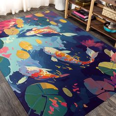 a colorful rug with koi fish and leaves on it in front of a bookshelf