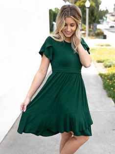 Get ready to meet your new wardrobe must-have: the Katie Dress! From its stylish design to its effortlessly comfortable fit, this dress is perfect for any occasion. And with stunning colors that combine elegance and trendiness, you're sure to make a statement wherever you wear it. Size: Small 0-4 Medium 6-8 Large 10-12 XL 12-14 Spring Stretch Solid Color Dresses, Spring Stretch Solid Color Midi Dress, Green Knee-length Dress For Brunch, Green Non-stretch Midi Dress, Green Stretch Midi Dress For Spring, Green Stretch Knee-length Dress, Fit And Flare Spring Dresses, Fit And Flare Dress For Spring, Spring Solid Color Fit And Flare Dress