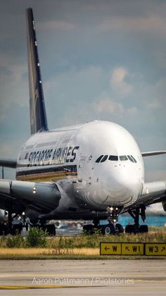 an airplane that is sitting on the runway