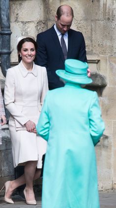 the duke and princess of cambridge are standing next to each other