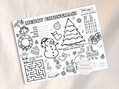 a merry christmas card with doodles and other holiday related items on top of it