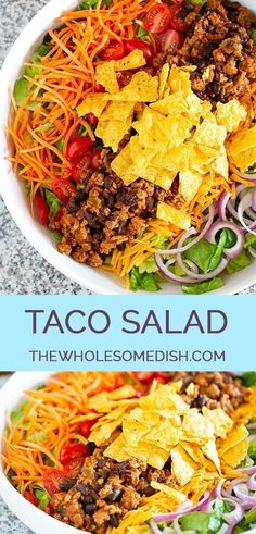 two bowls filled with taco salad on top of a table