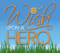 the words wish upon a hero are in front of green grass