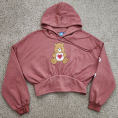 New With Tag. Care Bears Cropped Hoodie. Size X Large. Make A Offer Bundle More Stuff And Send A Offer Pink Cozy Crew Neck Hoodie, Cute Hooded Hoodie For Loungewear, Cozy Pink Crew Neck Hoodie, Cozy Pink Top With Drawstring Hood, Casual Pink Hoodie With Crew Neck, Cute Hoodie Sweatshirt For Loungewear, Trendy Pink Fleece Sweatshirt, Cozy Pink Hoodie With Drawstring Hood, Pink Fleece Hoodie Top