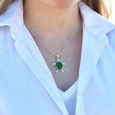 "*This listing is for one sea glass turtle pendant. The model pictured is shown wearing green color in an 18\" length.* CURRENTLY OUT OF STOCK IN SEAFOAM, GREEN, and AQUA. Please send us a message if you would like to be notified when aqua is back in stock. This whimsical sea glass necklace features a gorgeous piece of sea glass that has perfectly preserved at the center of a sterling silver turtle. The sea glass has been set with a custom open back design to allow the light to shine through and Sea Glass Turtle, Sea Glass Anklet, Glass Turtle, Turtle Sea, Seaglass Jewelry, Beach Glass Necklace, Sea Turtle Necklace, Sea Glass Bracelet, Beachglass Jewelry