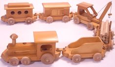 wooden toy trucks and cars are arranged in a circle