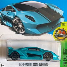 a blue toy car with black rims on it's body and the name lamborgchinn sesto elemento