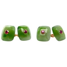 Very attractive rectangular double-sided cufflinks. Made and signed by TRIANON. Beveled jadeite with faceted bezel-set rubies in the center. Chain link closure. 1/2" x 2.3." Distinctive look. They subtly catch the light and will pick up shades of fabric. Alice Kwartler has sold the finest antique gold and diamond jewelry and silver for over forty years. Designer Green Jewelry For Formal Occasions, Formal Green Polished Gemstones, Elegant Green Cufflinks For Formal Occasions, Elegant Rectangular Gemstones For Formal Occasions, Elegant Rectangular Gemstones For Formal Events, Luxury Rectangular Gemstones As Gift, Skull Cufflinks, Watch Cufflinks, Gold Cufflinks