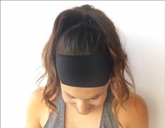 "{ You'll LOVE it } The Black Onyx Solid Headband is made for movement. Whether taking your favorite spin or yoga class, running the distance or out on the town, this headband will stay put and comfortable while you're on the move. Go girl. { Made for Motion } Because its made of Nylon/Lycra, its light weight, washable and holds its own against a sweat sesh. As a marathoner, outdoors lover and fitness enthusiest I know it's a must! The stretchy and seamless 3.5 inch wide band is tapered in the b Fitted Lightweight Black Activewear, Lightweight Black Activewear For Gym, Black Lightweight Yoga Activewear, Lightweight Black Yoga Activewear, Lightweight Black Activewear For Yoga, Lightweight Sports Activewear, Versatile Lightweight Activewear For Sports, Supportive Casual Activewear For Running, Lightweight Stretch Activewear For Training