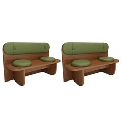 two wooden benches sitting next to each other on top of a white floor with green cushions