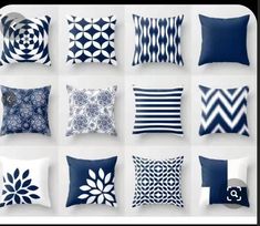 blue and white pillows are arranged in rows on a gray background, with different patterns