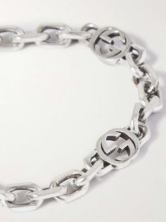 Shop GUCCI Silver Chain Bracelet, Explore the latest in-season GUCCI collection today on MR PORTER Classic Silver Metal Chain Bracelet, Designer Metal Jewelry, Designer Silver Chain Bracelet As Gift, Designer Silver Chain Bracelet For Gift, Classic Silver Chain Metal Bracelet, Classic Silver Chain Link Bracelets, Luxury Gucci Silver Chain Jewelry, Luxury Engraved Oval Link Bracelet, Gucci Sterling Silver Chain Jewelry