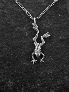 "This Frog pendant is Sterling Silver. .The included chain is a Sterling Silver Figaro 50 chain. You may choose 16, 18 or 20 inch at the same price. Other length available at sightly higher prices. The Frog pendant measures 13/8\" long by 1/2\" across. I hand cast all my pieces using the lost wax casting method. Please ask your needs. You may call me with questions, often I am out so please use my machine. 831-476-3176. Satisfaction Guaranteed! I send items USPS First Class unless otherwise dire Frog Pendant, Wax Casting, Lost Wax Casting, Necklace Long, The Frog, Lost Wax, Hand Cast, Sterling Silver Chain, Sterling Silver Chains