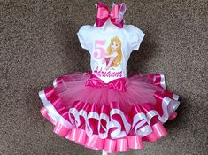 This set includes a shirt, tutu and bow! Available in sizes 3 months to 10 years. *Please be sure to include name and age at checkout* Request a custom tutu! We can do any color or color variation. All of our tutu's are beautifully sewn and double layered. They are made with yards and yards of 100% high quality diamond net nylon tulle and  soft satin ribbon with a versatile elastic waist band. Make sure to check out all the sizing charts located in the pictures. WASHING INSTRUCTIONS Please, keep it in mind that T-shirts and tutus are handcrafted and decorations need a special care treatment, that's why I recommend only hand wash or over wash stains sparingly and let air dry. If you have any questions or concerns fell free to message me!  SHIPPING : We usually ship in 3 business days ( plea Princess Tutu Dress For Dress-up Party Season, Princess Tutu Necklace, Aurora Birthday, Purple Princess Tutu Dress For Dress-up, Sleeping Beauty Party, Birthday Costume, Costume Princess, Sleeping Beauty Tutu Ballet, Beauty Party