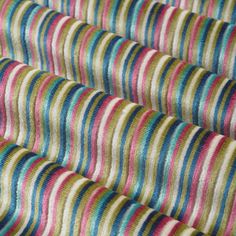 multicolored striped fabric is shown in close up