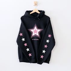 ✩ Shine bright like a Star Girl with our Y2K Aesthetic Hooded Sweatshirt! ✩ Perfect for lovers of grunge, streetwear, and Harajuku J-fashion ♡ Upgrade your wardrobe with this eye-catching piece and let your style speak for itself! ✧ More Y2K Fashion: https://www.etsy.com/shop/RainieshopDesign?section_id=45205004 ˗ˏˋ ✮ PRODUCT DETAILS ✮ ˎˊ˗ ✩ Gildan Women's Softstyle Tee ★ 100% ringspun cotton ✩ Light fabric (4.5 oz/yd² (153 g/m ★ Semi-fitted ✩ Tear-away label ★ Runs true to size ˗ˏˋ ✮ SIZING ✮ ˎˊ˗  ▸ Please refer to the last picture with size chart for sizes and product dimensions.  ˗ˏˋ ✮ CARE INSTRUCTIONS ✮ ˎˊ˗ ▸ Machine wash: cold (max 30C or 90F) ▸ Non-chlorine: bleach as needed ▸ Tumble dry: medium ▸ Do not iron ▸ Do not dry clean 𝘿𝙞𝙨𝙘𝙡𝙖𝙞𝙢𝙚𝙧: ✧ Please keep in mind colors may Y2k Cotton Sweatshirt For Streetwear, Y2k Style Cotton Sweatshirt For Streetwear, Cotton Y2k Style Sweatshirt For Streetwear, Trendy Cotton Hoodie With Star Print, Y2k Hoodie With Graphic Print For Winter, Y2k Hooded Graphic Sweatshirt, Y2k Graphic Print Hoodie For Winter, Y2k Hoodie With Letter Print, Y2k Winter Hoodie With Graphic Print