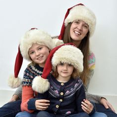 Our hand-stitched Christmas hats will definitely keep you warm on a winter's day or night, whether you're skating with your little ones, or on a festive pub-crawl. After all, they're made from the very same luxurious materials we use to make Santa's suits. The soft merino wool, huggable ivory faux fur and rich cotton lining keep Santa warm and cosy for 6 hours right up in the stratosphere on a chilly night. We tailor the hats in small, medium and large - small being suitable for children, and la Christmas Hats, Santa Suits, Luxury Christmas, Santa Hats, Pub Crawl, Christmas Hat, Christmas Morning, Santa Christmas, Christmas Santa