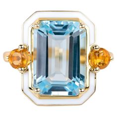 14K Gold Artdeco Style Enameled Cocktail Ring with 6-7.00 ct Sky Topaz and Citrine This ring was made with quality materials and excellent handwork. I guarantee the quality assurance of my handwork and materials. It is vital for me that you are totally happy with your purchases. 14K Solid Gold. with hallmark. Main Stone Details: -6-7.00 Ct. Sky Topaz Side-Left&Right Stone Details: -Total 0.80-0.90 ct Citrine -14K Solid Yellow Gold We design the jewelry you buy specifically for you. - We can prod Topaz And Citrine, Cocktail Jewelry, Gold Cocktail Ring, Gold Cocktail, Diamond Free, Citrine Stone, Modern Ring, Topaz Stone, Rose Gold White