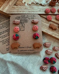 some pink and green decorated cookies on a table