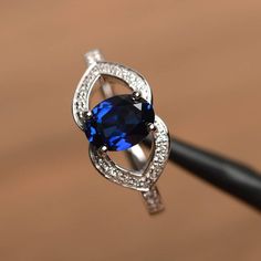 a blue ring sitting on top of a table