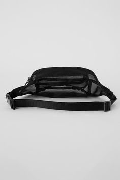 For everything from festivals to Friday morning coffee missions, you'll reach for the Sheer Fanny Pack. It's made from see-through, gently structured mesh with a roomy interior, 2 main compartments and a back pocket for stashing credit cards or keys. And thanks to the adjustable, clip-on buckle, you can style it slung across the chest or fastened at the waist depending on the mood. Functional Mesh Bags For Daily Use, Black Mesh Bags For Daily Use, Black Mesh Bag For Daily Use, Black Travel Bag With Mesh Lining, Black Mesh Bag For Outdoor Activities, Black Mesh Bags For Outdoor Activities, Black Mesh Bags, Practical Black Nylon Belt Bag, Black Nylon Belt Bag With Pockets