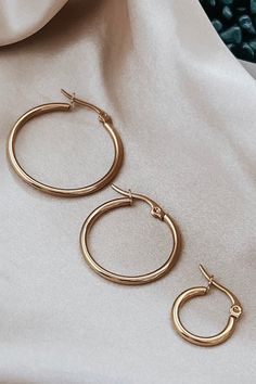 Description Perfect everyday accessory - 18k gold plated hoops, perfect for dressing up or down. Materials & Care Tarnish and water resistant. 18k Gold plated stainless steel. Hypoallergenic Wipe as needed, avoid harsh chemicals. Store jewelry in a small plastic zip lock. Measurements Small 1/2" Medium 1" Large 1 1/4" Everyday Round Gold-plated Hoop Earrings, Everyday Round Gold Plated Hoop Earrings, Hypoallergenic Gold Stainless Steel Hoop Earrings, Stainless Steel Hoop Earrings For Everyday, Trendy Tarnish Resistant 14k Gold Filled Hoop Earrings, Classic Stainless Steel Hoop Huggie Earrings, Trendy Hypoallergenic Gold Plated Hoop Earrings, Everyday Stainless Steel Hoop Earrings, Hypoallergenic Stainless Steel Hoop Huggie Earrings