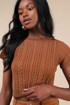 Your autumn style will be truly special a with trendy must-have like the Lulus Modish Ways Rust Brown Cable Knit Short Sleeve Sweater Top! This soft and stretchy sweater boasts a variety of classic designs, including cable, seed, and ribbed knit textures (plus pierced detailing), that makes this piece truly unique. A timeless crew neckline and a fitted, cropped bodice are framed by cute short sleeves, while contrasting ribbed knit trim at the neckline, cuffs, and hem completes the look. Fit: Thi Trendy Brown Knit Top For Layering, Fitted Pointelle Knit Sweater For Fall, Fall Crew Neck Knit Top, Crew Neck Knit Top For Fall, Brown Stretch Sweater For Spring, Casual Fitted Brown Sweater, Cable Knit Crew Neck Top For Fall, Crew Neck Cable Knit Top For Fall, Stretch Cable Knit Top For Fall