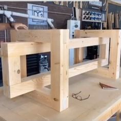 a man is working on some wooden furniture