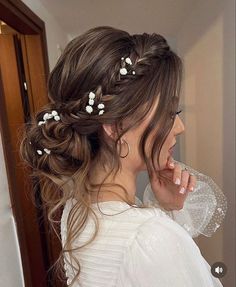 a woman with flowers in her hair