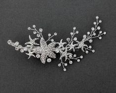 a bridal hair comb with crystal flowers and leaves