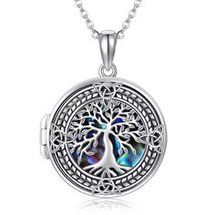 PRICES MAY VARY. 🌲 Design:Tree of life symbol of good luck,health,growth and strength.The tree of life locket inlay with abalone shell, mysterious, elegant and charming.A unique jewelry gifts to give someone you love. 🌲 Material :925 sterling silver celtic knot tree locket necklace with abalone shell, vintage,classic. Lead-Free & Nickel-Free, Hypoallergenic and safety for sensitive skin. 🌲 Size :Tree of Life photo locket pendant:0.78inch(20mm). Chain length: 18"+2 inch extension chain. packag Celtic Knot Tree, Vintage Locket Necklace, Shell Tree, Sterling Silver Locket Necklace, Silver Locket Necklace, Picture Locket, Photo Locket Necklace, Sterling Silver Locket, Silver Locket