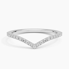 a white gold ring with diamonds on it