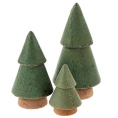 three green ceramic christmas trees with cork tops