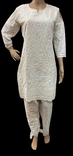 Harshali export  Embroidered off white cod set is very special dress for wedding and party dress . Cotton comfortable dress . All size available 38-44  Please add a message which size you want .  M = 38 size  L =  40 size  Xl = 42 size  Xxl = 44 size  Indian scale Elegant Cotton Salwar Kameez With Chikankari Embroidery, White Dresses With Intricate Embroidery For Navratri, White Designer Dress For Diwali, Bollywood Style White Dress For Diwali, Festival Chikankari Embroidery Off-white Dress, Elegant Semi-stitched Cotton Dress, Bollywood Cotton Palazzo Set For Wedding, Bollywood Style Wedding Cotton Palazzo Set, Festive Cotton Dress With Self Design