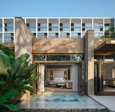 an outdoor hot tub in the middle of a courtyard