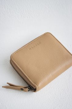 "Check out our other products from our shop below:  https://www.etsy.com/shop/MANDRNdesign The Quin Wallet was designed with simplicity in mind. Made from premium genuine leather this wallet features two double-slotted sections to hold your cards safely, room for folded cash, a lipstick tube, and a zip coin pouch. Designed to work easily with all of your MANDRN bags to keep your essentials close and within reach, make the most of this timeless accessory made with love by our Mexican artisan frie Minimalist Leather Wallet, Wallet Minimalist, Lipstick Tube, Leather Fanny Pack, Coin Wallet, Wallet Gifts, Genuine Leather Wallets, Leather Conditioner, Money Clip Wallet