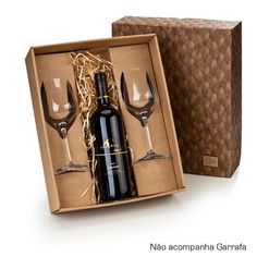 a wine bottle and two glasses in a box