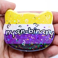 someone is holding a magnet with the word myan - binay on it