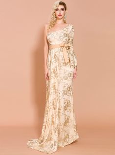 You are in search of a statement-making piece, look no further than this gold sequin party dress with all-over sparkle from kemedress. Layer of richly sequin creates the most ornate bodice, which radiates shimmer and sparkle. Long, sequin sleeve extends from the bodice, finishing in a sequin cuff adding a classic element to this glamorous style. The sequin from the bodice extends slightly onto the tulle skirt before extending into a full sheath silhouette, complete with embellished floral sequin. The romantic back of this one shoulder dress zips up and is complemented with a sparkling train. You can wear this dress as a formal look! Sequin Prom Dresses Mermaid, Long Sleeve Evening Dress, Sequins Prom Dress, Prom Dress Mermaid, 2020 Prom Dresses, Floor Length Prom Dresses, Dress Mermaid, Affordable Prom Dresses, Sequin Prom Dress