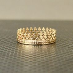 14k Solid Gold Crown Ring - Glowing 14k Gold Crown/Princess Ring - Comes in a cute box ready for gift giving. - Made to order, just for you. These rings are handcrafted using a solid 14k gold crown design. I have another slightly more dainty solid 14k gold crown ring design here: https://etsy.me/2Mirsdx View all of my silver and colored crown rings here: https://etsy.me/2PfTHaf You can see the other colors I make this ring in the 5th photo. { Details } . * About 5.3mm Wide and.7mm thick * Beauti Wedding Jewelry With Crown Design, 14k Gold Crown Jewelry For Weddings, Crown Shaped Jewelry For Anniversary, Princess Style Jewelry With Tall Crown Design, Elegant Gold Jewelry For Sweet 16, Princess Crown Jewelry For Anniversary, Yellow Gold Crown Design Jewelry For Wedding, Yellow Gold Crown Design Wedding Jewelry, Yellow Gold Crown Wedding Rings