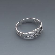 Antiqued sterling silver toe ring with Celtic knot design adjusts to fit most sizes. Ideal for display counters and artisan fairs. Celtic Zodiac Signs, Celtic Zodiac, Sterling Silver Toe Rings, Celtic Knot Designs, Silver Toe Rings, Fire Mountain Gems And Beads, Toe Rings, Celtic Knot, Ring Gift