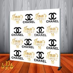 the chanel backdrop is displayed on a wooden floor