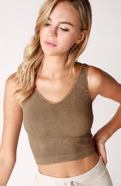 Comfy & Stylish! Pair with pretty much anything! Size: One Size Fits Most (XS-L) Description: Ribbed knit top featuring a v-neckline and cropped silhouette. Fabric: 92% Nylon / 8% Spandex Made in USA Does not have padding, wiring or cups. We believe in highlighting the natural shape of a woman's body. V Neck Crop Top, Ribbed Crop Top, Ribbed Knit Top, Neck Crop Top, Natural Shapes, Pretty Much, Knit Top, Ribbed Knit, Made In Usa