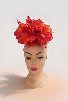 One of a kind, beautiful Fascinator Hat headband. This features a firey red orange dahlia flower.  It is very large and stunning.  The photos don't really do it justice very beautiful in person.  Perfect for weddings or to wear to the Kentucky Derby.    Our sweater crew love to display their talents on other things other than sweaters, this is just one example. You can show this off at any event, or just out for coffee. Adjustable Red Headband For Spring, Red Spring Fascinator Headband, Red Spring Headband Fascinator, Red Spring Headband, Red Headband For Spring, Red Headband Hair Accessories For Spring, Red Headband Fascinator For Kentucky Derby, Flower Headband For Kentucky Derby, Red Headband Fascinator For Races