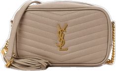 Luxury Beige Flap Bag With Removable Pouch, Beige Evening Bag With Gold-tone Logo Plaque, Ysl Camera Bag Beige, Beige Rectangular Bag With Gold-tone Logo Plaque, Ysl Camera Bag Mini, Designer Beige Bags With Gold-tone Logo Plaque, Designer Beige Shoulder Bag With Gold-tone Logo Plaque, Ysl Lou Camera Bag, Ysl Gaby Zipped Pouch